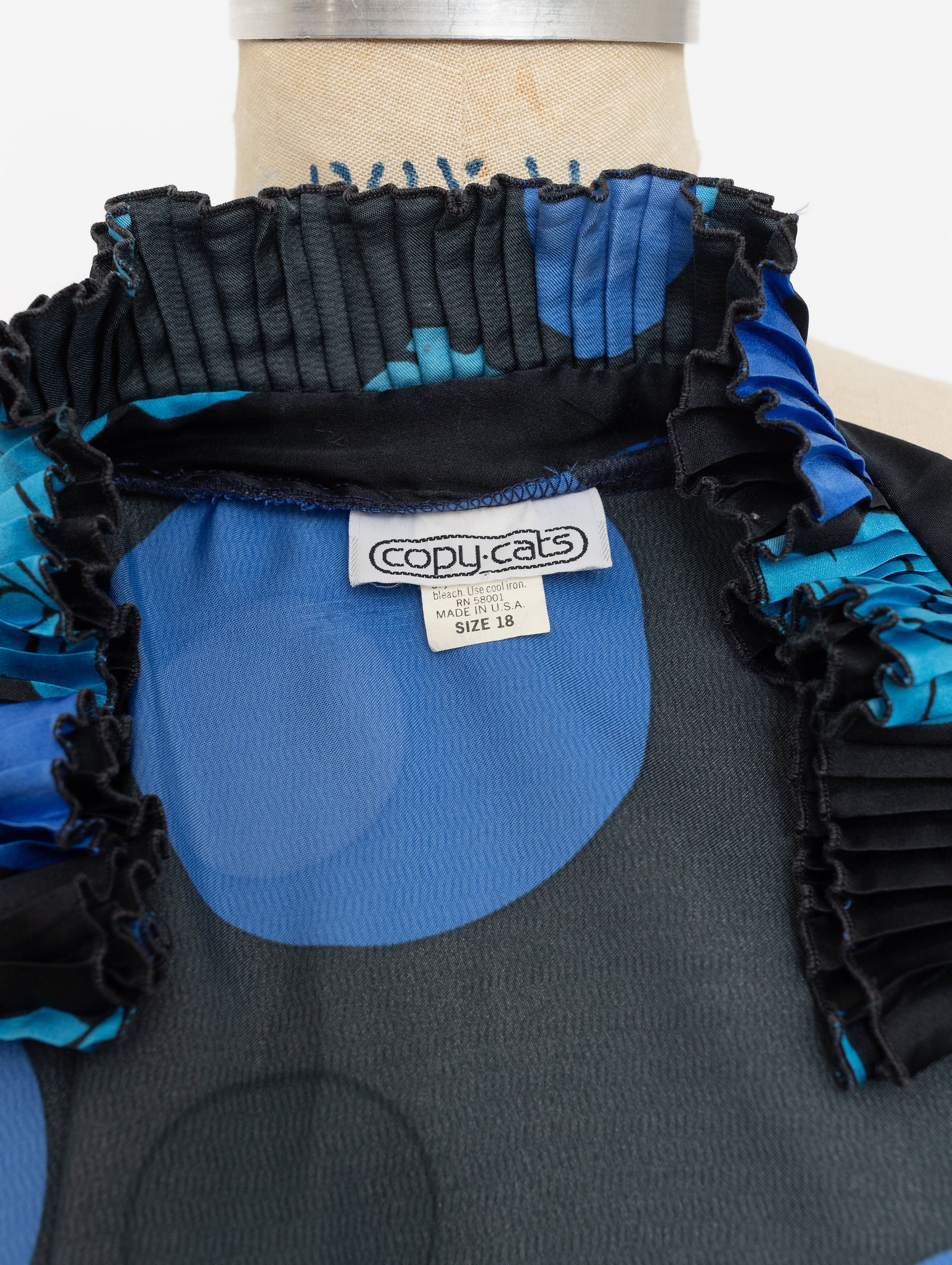 90s black and blue floral print blouse with ruffle collar
