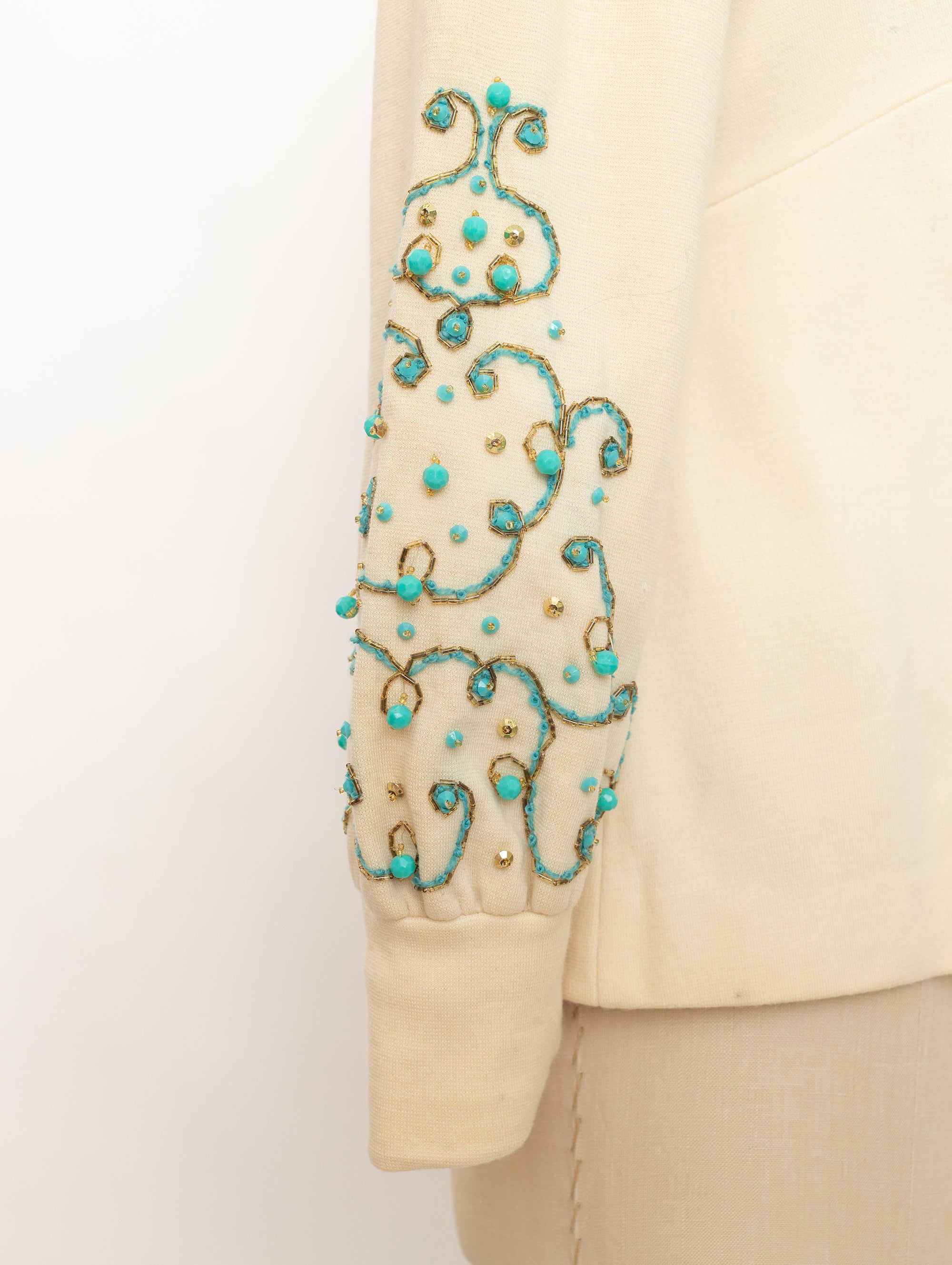 1960s cream mock neck long sleeve top with turquoise beads
