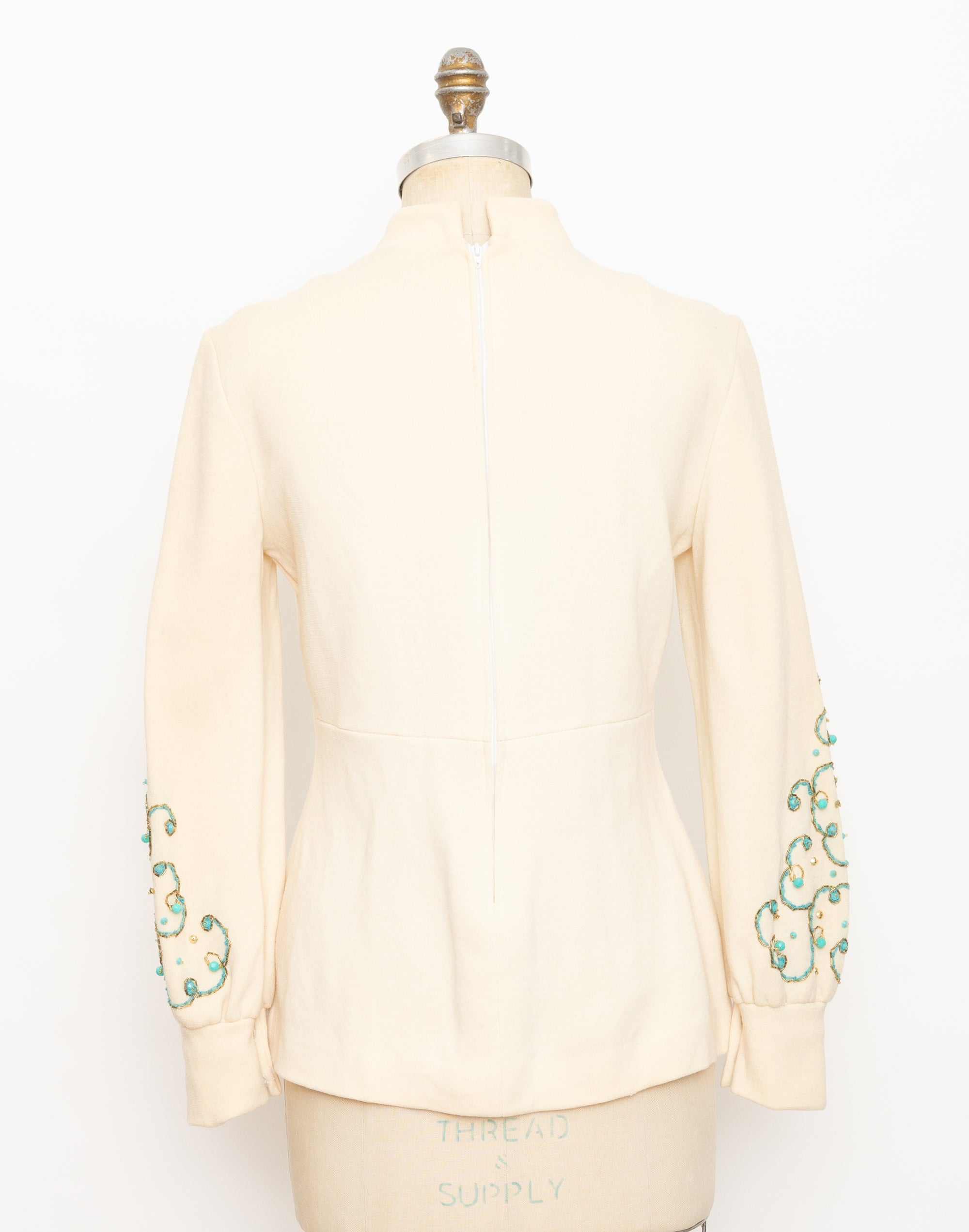 1960s cream mock neck long sleeve top with turquoise beads